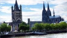 Der Klner Dom (rechts) und die Gro St. Martin-Kirche.  Von 1150 bis 1240 die Kirche des Benediktinerklosters Gro St. Martin.